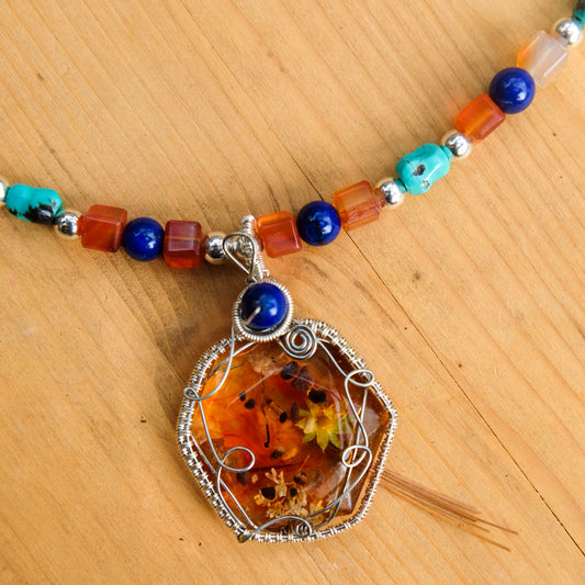 Jasmyn• Orange resin, yellow flowers, pebbles, russula mushrooms, Turquoise, carnelian, sodalite